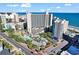 Stunning aerial view of oceanfront resort with pools, parking, and city views at 201 74Th Ave. N # 2534, Myrtle Beach, SC 29572
