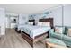 Cozy bedroom featuring two beds, a sofa, and charming nautical decor for a relaxing getaway at 201 74Th Ave. N # 2534, Myrtle Beach, SC 29572