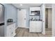 Efficient kitchenette features modern microwave, sink, and cabinets; ideal for quick meals at 201 74Th Ave. N # 2534, Myrtle Beach, SC 29572