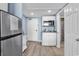 Compact kitchenette with stainless steel appliances, granite counters and access to a shower room at 201 74Th Ave. N # 2534, Myrtle Beach, SC 29572