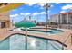 Outdoor lazy river with palm trees and blue skies creating a relaxing resort atmosphere at 201 74Th Ave. N # 2534, Myrtle Beach, SC 29572