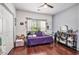 Bedroom with hardwood floors, a ceiling fan, and ample natural light at 203 Old Hickory Dr., Conway, SC 29526
