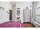 Bedroom featuring hardwood floors, an arched window, and stylish decor at 203 Old Hickory Dr., Conway, SC 29526