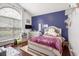Cozy bedroom with hardwood floors, an arched window, and stylish decor at 203 Old Hickory Dr., Conway, SC 29526