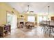 Bright living space with fireplace, tiled floors, comfortable furnishings, and easy access to the patio or backyard at 203 Old Hickory Dr., Conway, SC 29526
