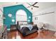 Spacious main bedroom featuring hardwood floors, lots of natural light, and modern decor at 203 Old Hickory Dr., Conway, SC 29526
