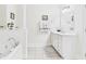 Well-lit bathroom offers a separate tub and sink, a modern faucet and plenty of counter space at 2180 Waterview Dr. # 738, North Myrtle Beach, SC 29582