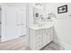 Bathroom features a white vanity with storage, a large mirror and soft lighting at 2180 Waterview Dr. # 738, North Myrtle Beach, SC 29582