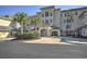 Elegant building exterior with lush landscaping and a welcoming entrance with interlocking brick drive at 2180 Waterview Dr. # 738, North Myrtle Beach, SC 29582