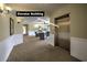 Hallway view of the elevator and adjacent sitting area that create a welcoming and functional common space at 2180 Waterview Dr. # 738, North Myrtle Beach, SC 29582