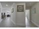Hallway with decorative wall art and hardwood floors extending to the dining room at 2180 Waterview Dr. # 738, North Myrtle Beach, SC 29582