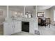 Modern kitchen featuring white cabinetry, tile floors, and stainless-steel appliances at 2180 Waterview Dr. # 738, North Myrtle Beach, SC 29582