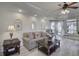 Inviting living room with comfortable seating, neutral tones, and abundant natural light at 2180 Waterview Dr. # 738, North Myrtle Beach, SC 29582
