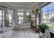 Charming sunroom with large windows, natural light, and view of community at 2180 Waterview Dr. # 738, North Myrtle Beach, SC 29582