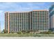 High-rise resort building featuring multiple balconies overlooking the ocean at 2207 S Ocean Blvd. # 718, Myrtle Beach, SC 29577