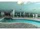 Unique shaded pool area with fountains, tile accents, artful pillars, and ambient lighting at 2207 S Ocean Blvd. # 718, Myrtle Beach, SC 29577
