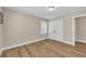 Bedroom featuring hardwood floors, bright natural light, and closet for storing at 265 Powell Loop, Andrews, SC 29510