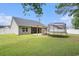 This property features a backyard with a patio and trampoline, ideal for outdoor enjoyment and Gathering activities at 276 Avery Dr., Myrtle Beach, SC 29588