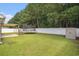 Well-kept backyard featuring a patio, trampoline, storage shed, and a privacy fence, creating a private outdoor retreat at 276 Avery Dr., Myrtle Beach, SC 29588