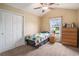 Cozy bedroom with neutral walls, carpeted floors, and large windows provides comfort at 276 Avery Dr., Myrtle Beach, SC 29588