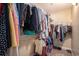 Walk-in closet with well-organized shelving and hanging rods offers ample storage space at 276 Avery Dr., Myrtle Beach, SC 29588