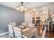 Open-concept dining area with views of the kitchen, providing a seamless flow for entertaining at 276 Avery Dr., Myrtle Beach, SC 29588