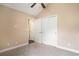 Empty bedroom featuring neutral colors, a carpeted floor, and closet with sliding doors at 276 Avery Dr., Myrtle Beach, SC 29588