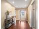Inviting foyer features hardwood floors, natural light, and decorative shelving and decor at 276 Avery Dr., Myrtle Beach, SC 29588