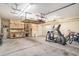 This large, organized garage offers plenty of space for storage and activities, with overhead racks and a workbench at 276 Avery Dr., Myrtle Beach, SC 29588