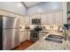 Well-equipped kitchen with stainless steel appliances, granite countertops, and ample cabinet space at 276 Avery Dr., Myrtle Beach, SC 29588