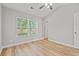 Empty bedroom featuring neutral decor, vaulted ceiling, ceiling fan, and natural light at 2965 Mount Olive Rd., Loris, SC 29569