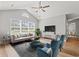 Spacious living room featuring vaulted ceiling, a large window, and modern furniture at 2965 Mount Olive Rd., Loris, SC 29569