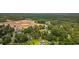 Aerial view of a neighborhood surrounded by lush greenery, indicating a serene and well-established community at 300 Crescent Dr., Conway, SC 29526
