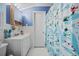 Cozy bathroom featuring a single sink vanity and a white shower curtain at 300 Crescent Dr., Conway, SC 29526