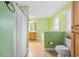 Bathroom featuring a tub, toilet, and vanity, with neutral-toned tile floors at 300 Crescent Dr., Conway, SC 29526