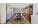 Formal dining room features a large china cabinet, dining table, and patterned rug at 300 Crescent Dr., Conway, SC 29526