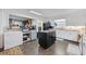 Spacious kitchen with an island, black appliances, white cabinets and butcher block countertops at 300 Crescent Dr., Conway, SC 29526