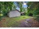 Property featuring a shed, a covered area, and a patch of grass at 300 Crescent Dr., Conway, SC 29526