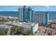 Elevated view showcasing a resort complex with ocean views and multi-level parking at 3000 N Ocean Blvd. # 209, Myrtle Beach, SC 29577