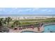 Easy beach access with inviting beach chairs, lush landscaping, and convenient pool access at 3000 N Ocean Blvd. # 209, Myrtle Beach, SC 29577