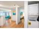 Convenient laundry area with a stacked washer and dryer, seamlessly integrated into the condo's layout at 3000 N Ocean Blvd. # 209, Myrtle Beach, SC 29577