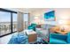 Inviting living room featuring stylish furniture, a balcony with ocean views, and modern decor at 3000 N Ocean Blvd. # 209, Myrtle Beach, SC 29577