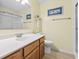 Inviting bathroom featuring a vanity with ample counter space and a glass-enclosed shower at 305 Hillside Dr. N # 205, North Myrtle Beach, SC 29582