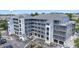 Lovely multi-story condo building showcasing multiple units and covered parking spaces at 305 Hillside Dr. N # 205, North Myrtle Beach, SC 29582