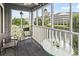 Tranquil screened porch with views of the lake and surrounding greenery at 305 Hillside Dr. N # 205, North Myrtle Beach, SC 29582