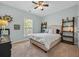 Nautical themed bedroom with a ceiling fan and natural light at 305 Splendor Circle, Murrells Inlet, SC 29576