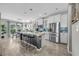 Spacious kitchen with a large island, stainless steel appliances, and a dining area at 305 Splendor Circle, Murrells Inlet, SC 29576