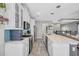 Modern kitchen with quartz countertops, stainless steel appliances, and tile backsplash at 305 Splendor Circle, Murrells Inlet, SC 29576
