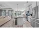 Open-concept kitchen with island, stainless steel appliances and views of the living room at 305 Splendor Circle, Murrells Inlet, SC 29576