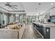 Inviting living room and kitchen area featuring modern finishes and an open floor plan at 305 Splendor Circle, Murrells Inlet, SC 29576